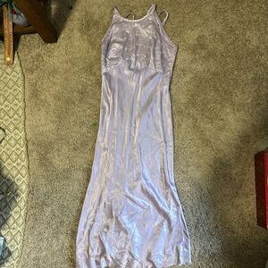 Medium , women’s silk dress with embroidery at the top.